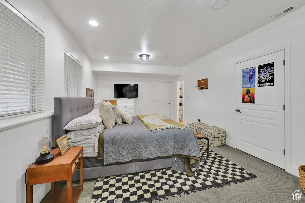 Bedroom featuring recessed lighting