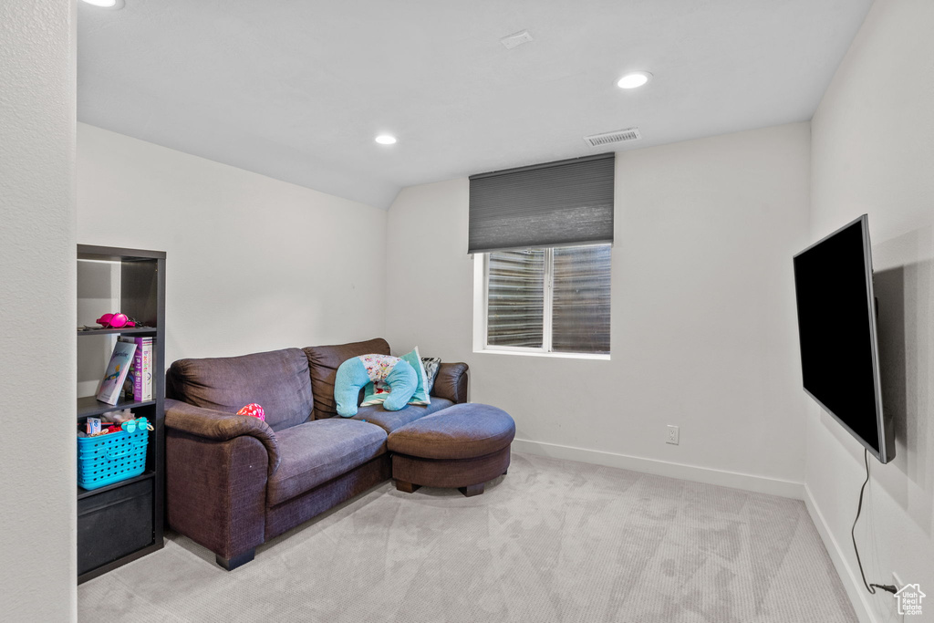 Living room featuring carpet floors and recessed lighting
