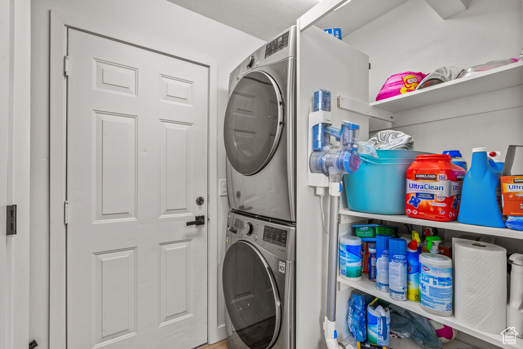 Laundry room with stacked washer / dryer