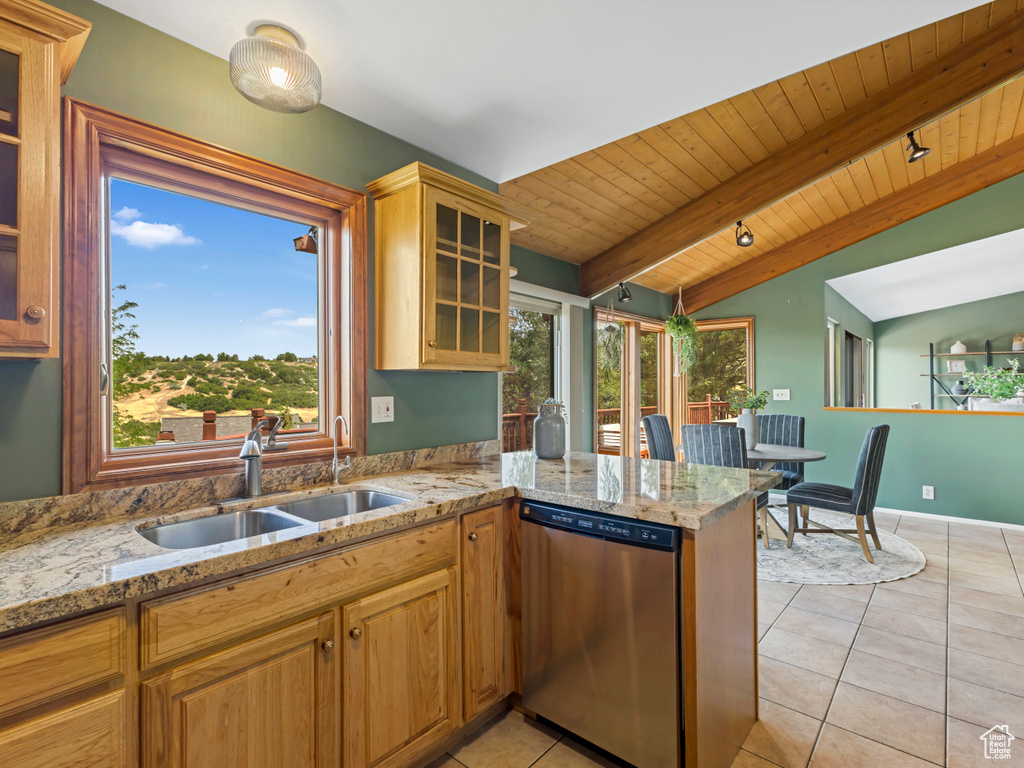 Kitchen featuring dishwasher, wood ceiling, light tile patterned floors, glass insert cabinets, and light stone countertops