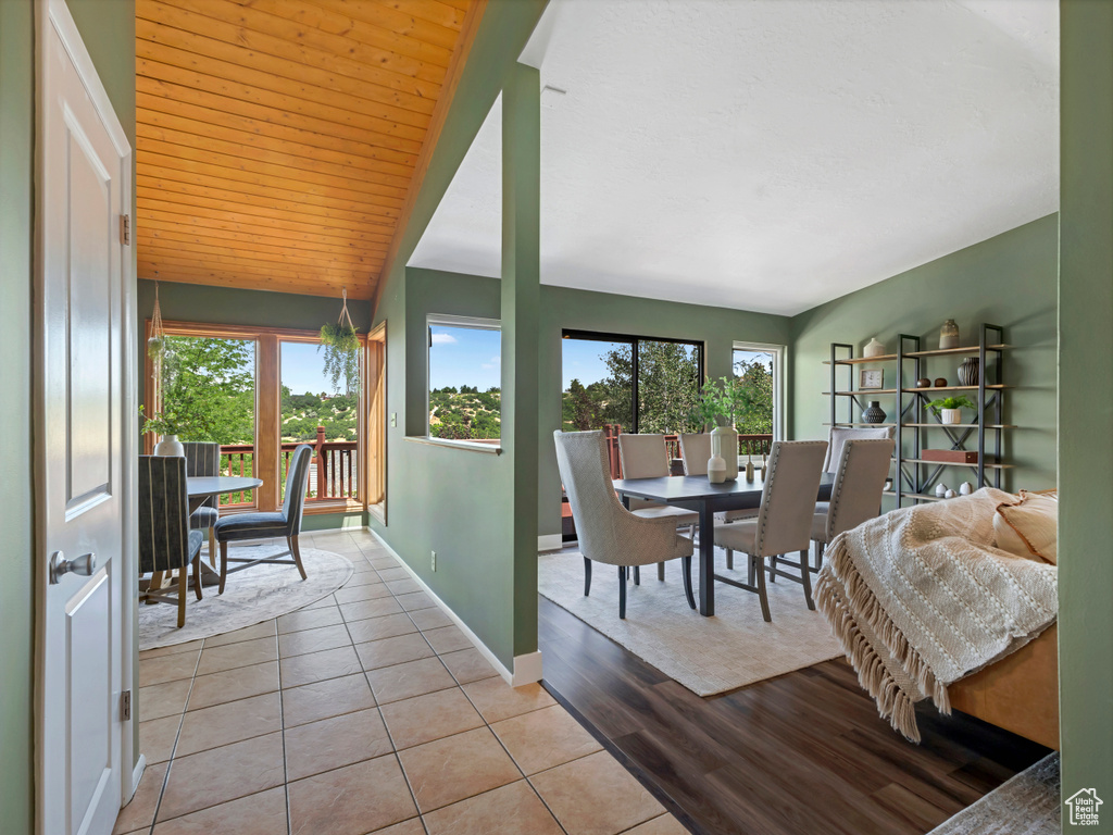 Dining room featuring healthy amount of natural light and tile patterned flooring