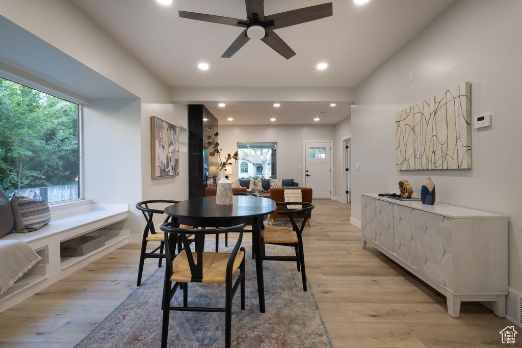 Dining space featuring a ceiling fan, plenty of natural light, light wood-style floors, and recessed lighting