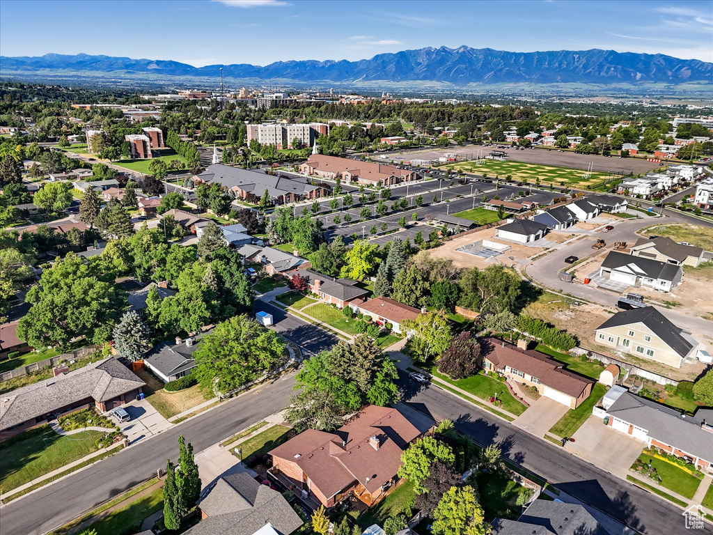 Aerial view of property's location with nearby suburban area
