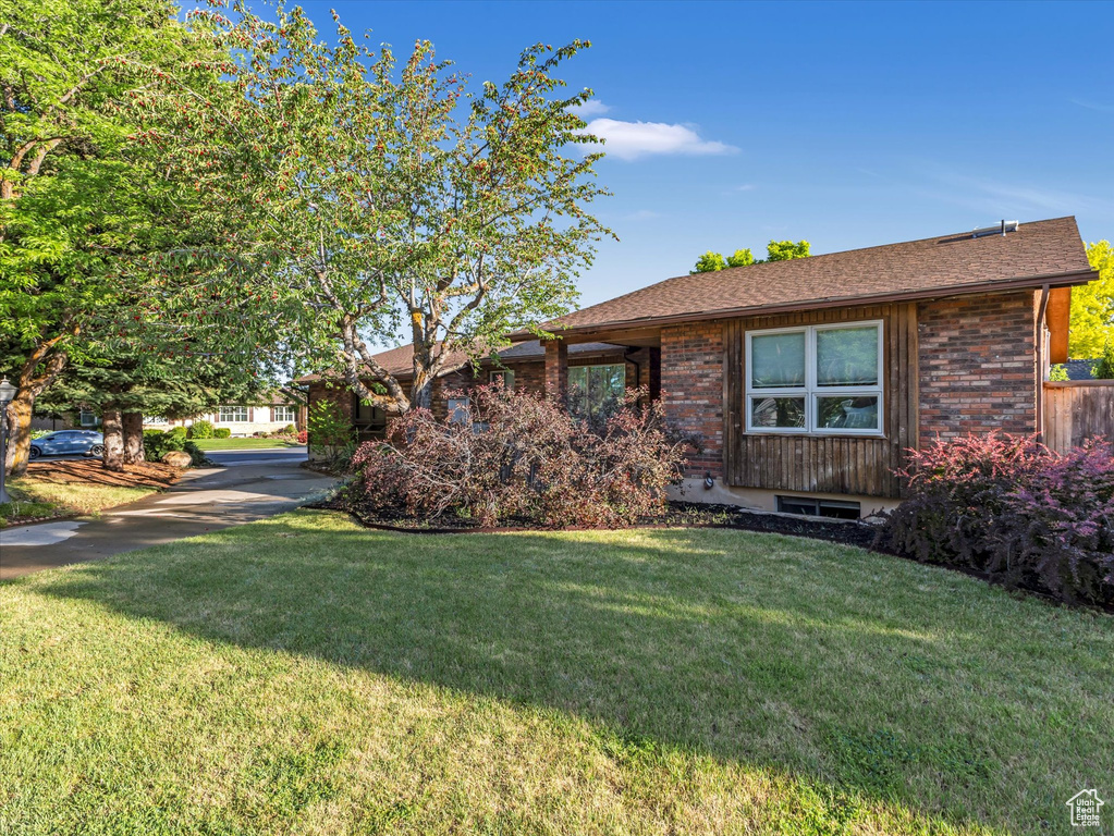 View of front of home with a front yard