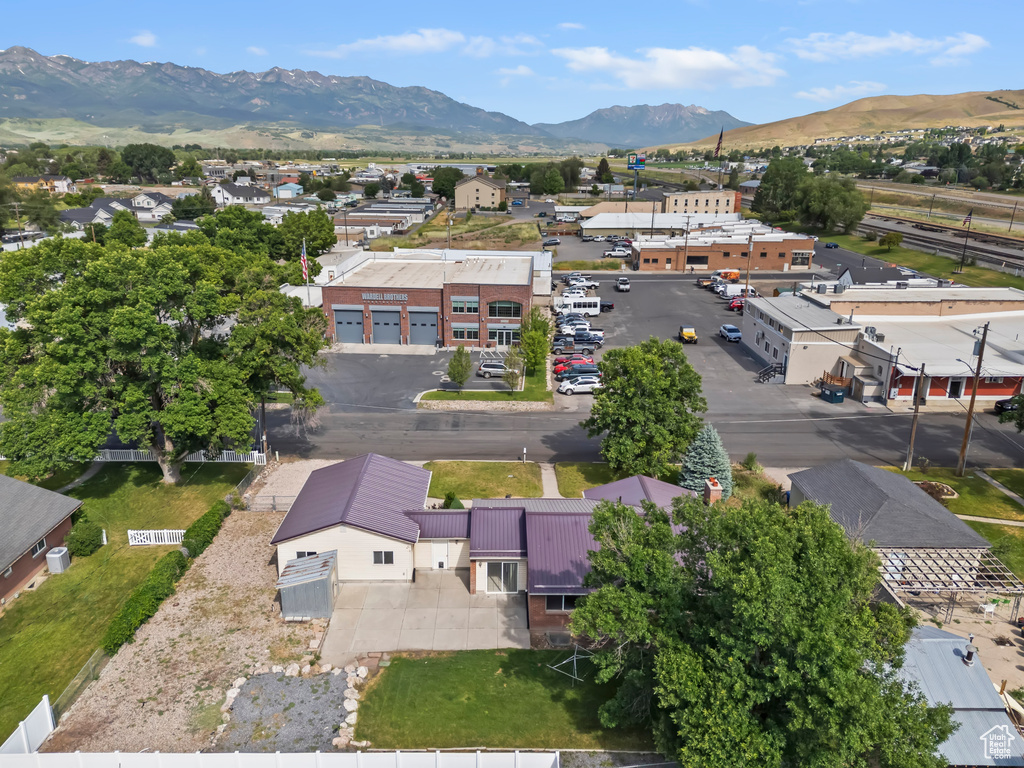 Aerial view of residential area with a mountain backdrop