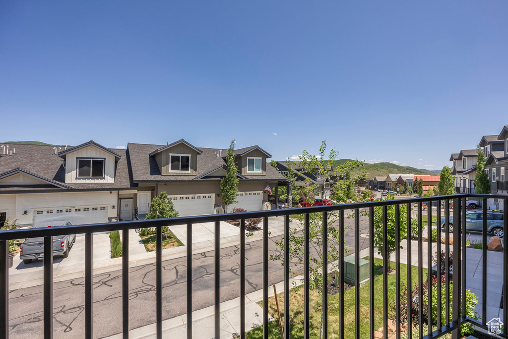 Balcony featuring a residential view