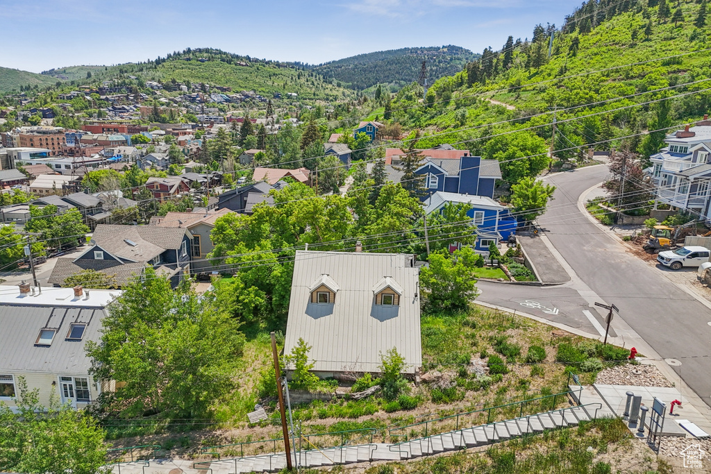 Aerial view of residential area with a mountain backdrop