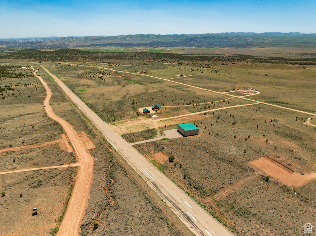 Aerial view of sparsely populated area with mountains