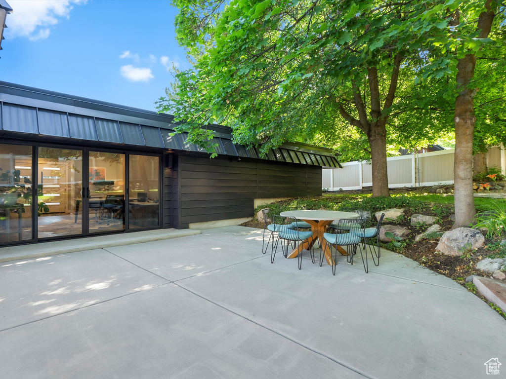 View of patio with outdoor dining space