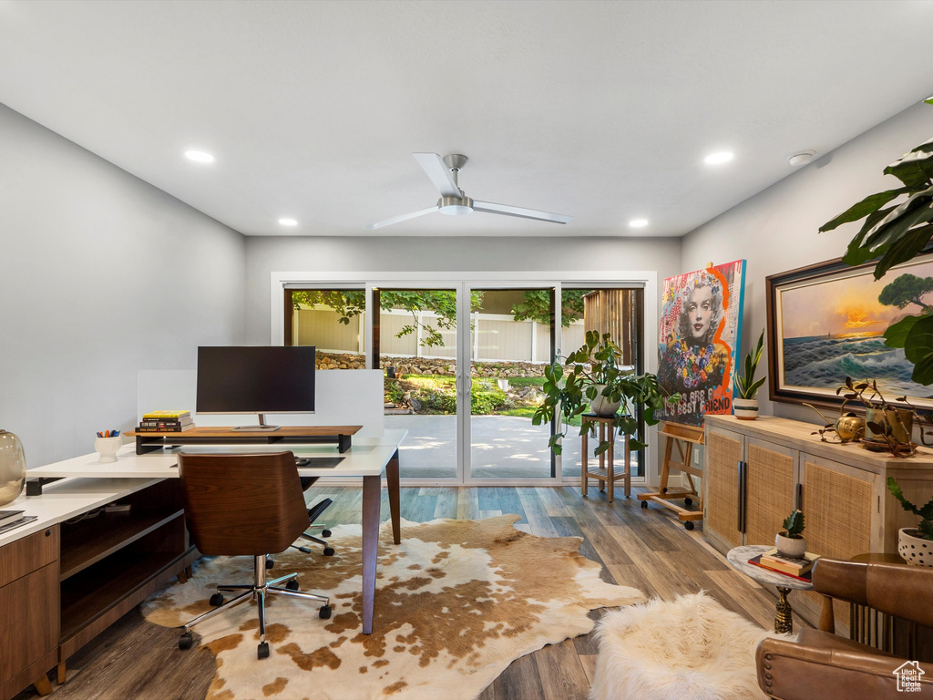 Home office with wood finished floors, recessed lighting, and ceiling fan