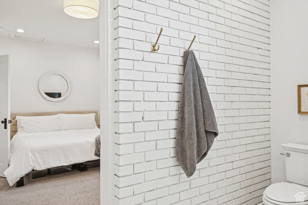 Bathroom with recessed lighting and ensuite bathroom