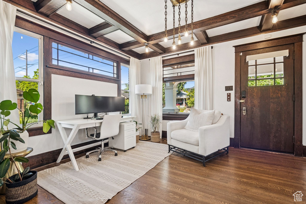 Office area featuring coffered ceiling, wood finished floors, and beamed ceiling