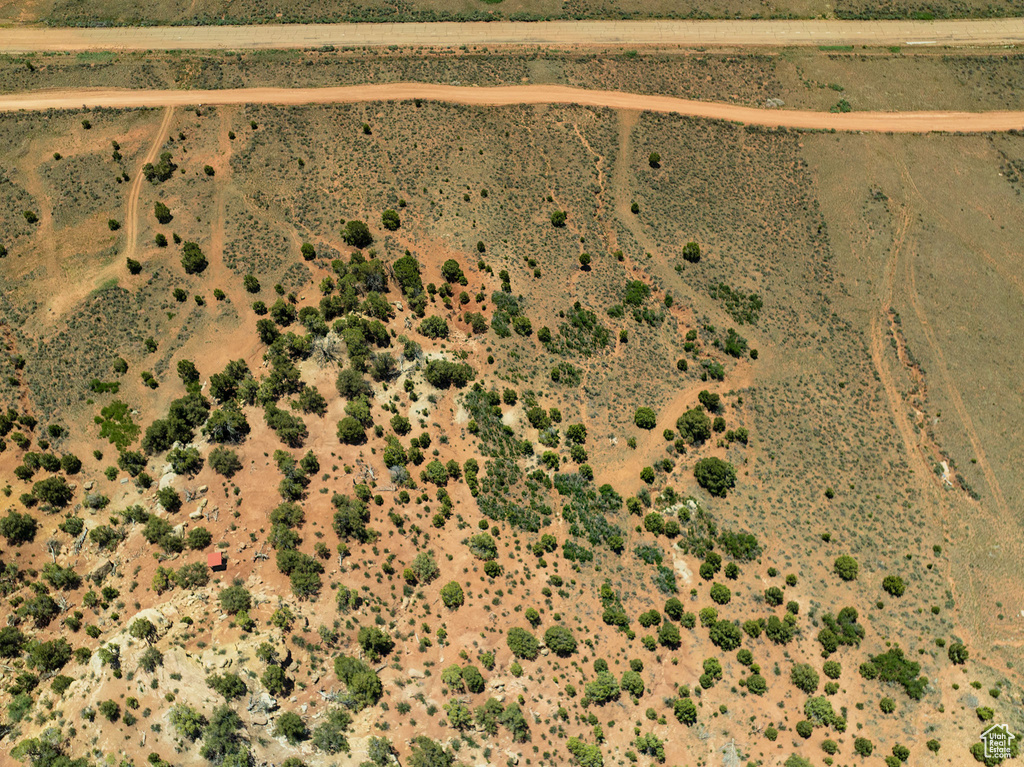Aerial view of property and surrounding area featuring a desert landscape and rural landscape