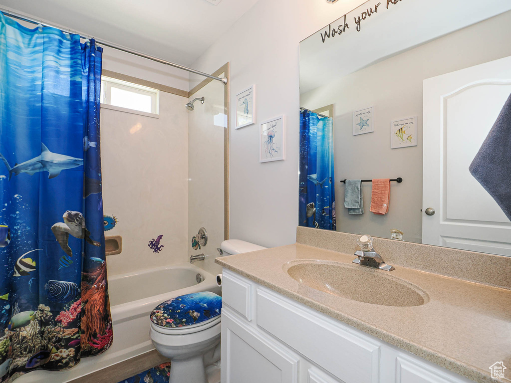 Full bath with vanity and shower / bathtub combination with curtain