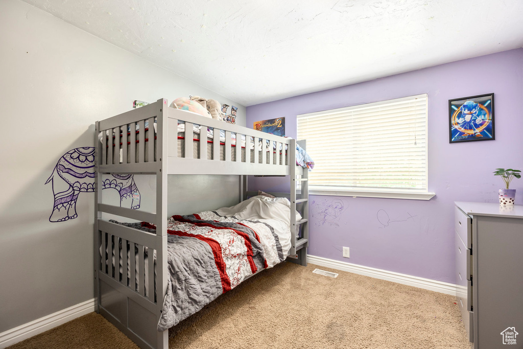 Bedroom with carpet flooring