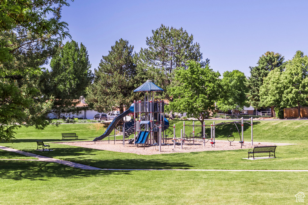 Communal playground featuring a yard