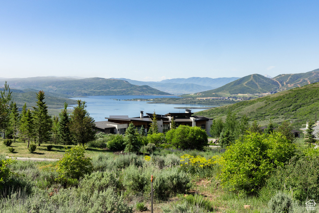 Mountain view featuring a large body of water