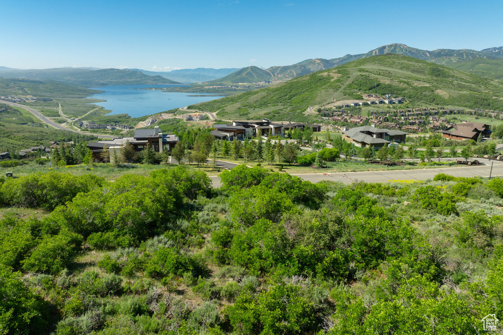 View of mountain backdrop with a nearby body of water