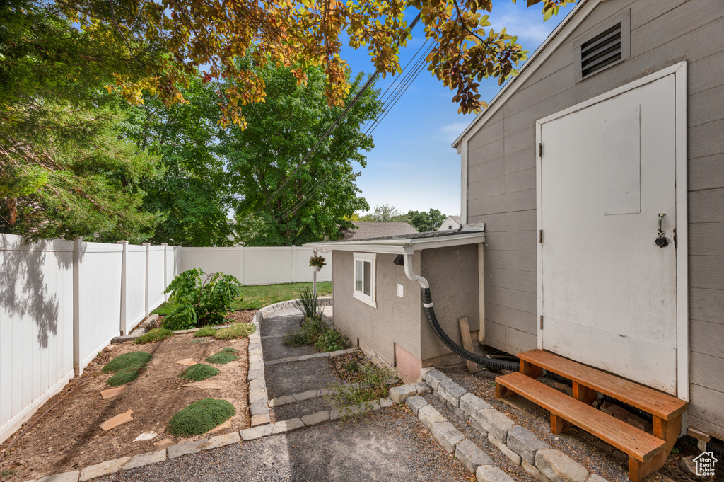 View of fenced backyard