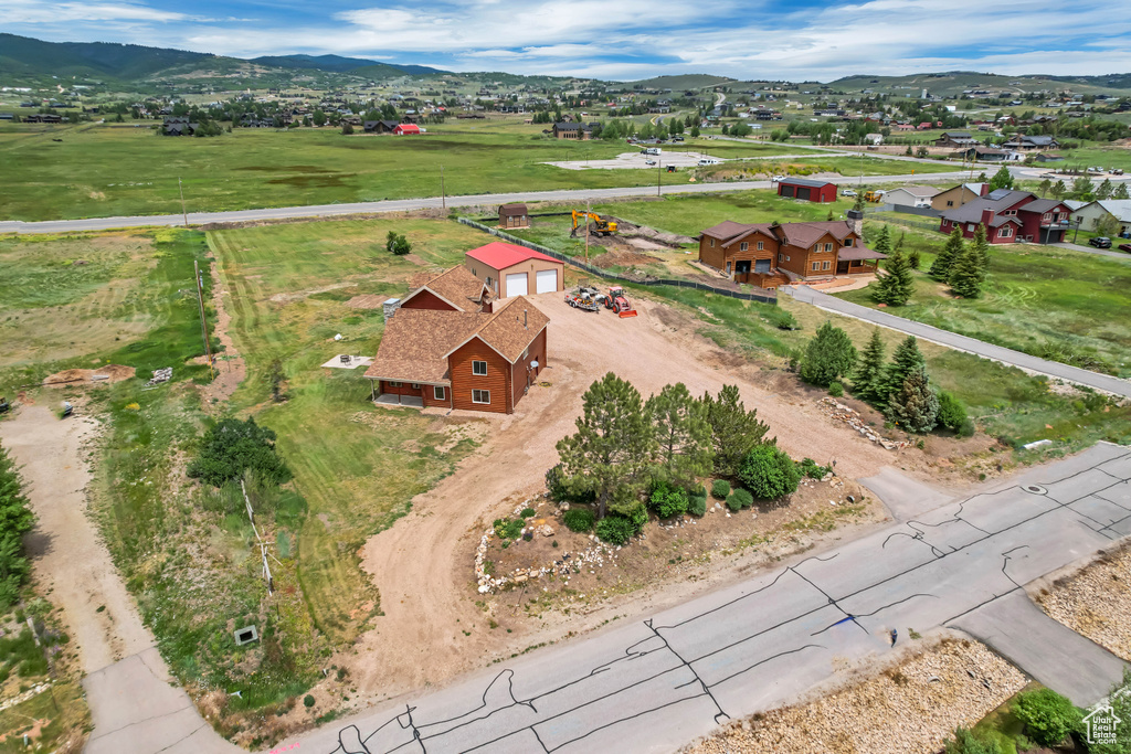 Aerial view of residential area with a mountain backdrop