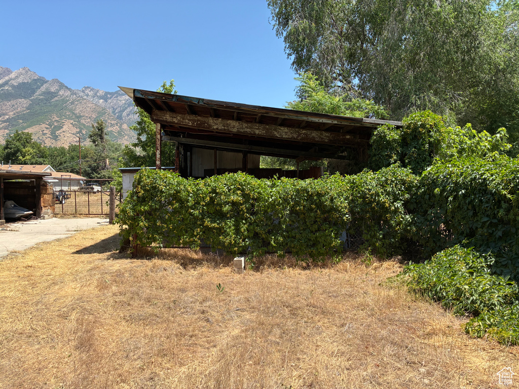 View of outbuilding featuring a mountain view