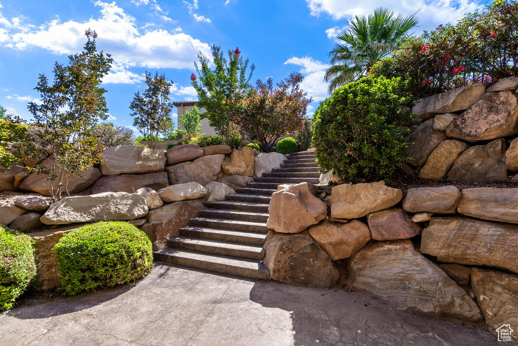 View of yard featuring stairway