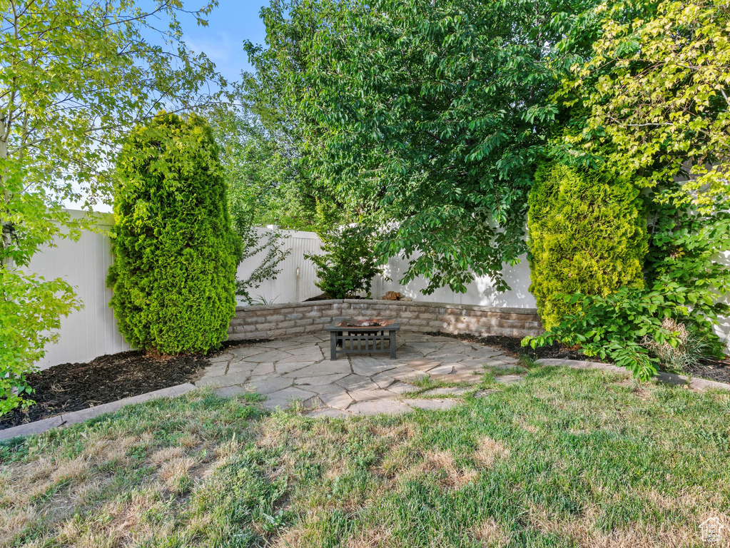 View of yard with a patio area