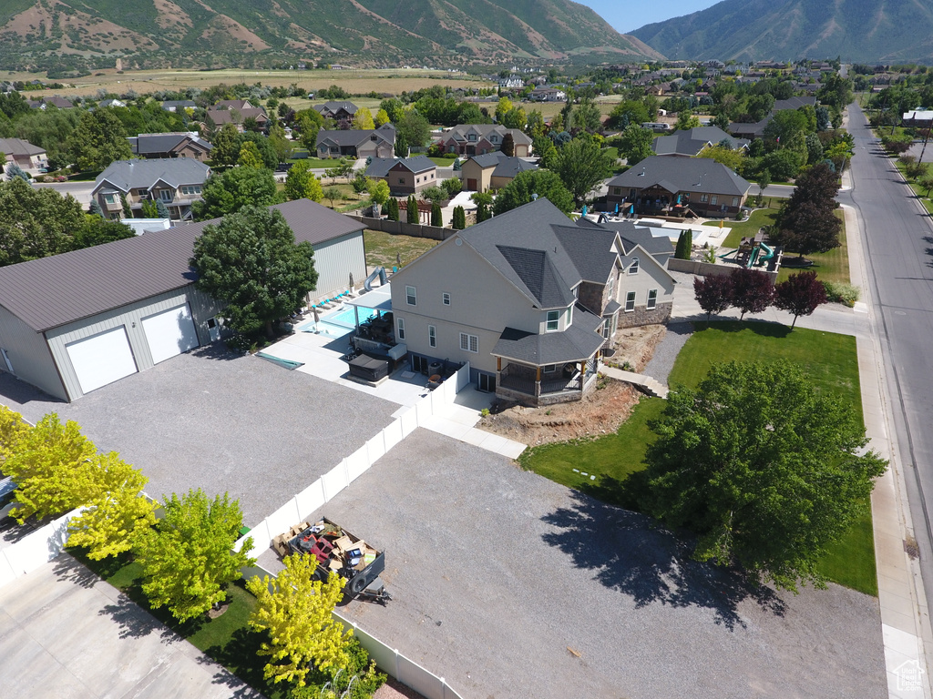 Aerial view of residential area with a mountain backdrop