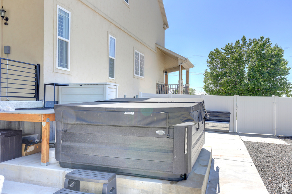 View of patio / terrace featuring a hot tub