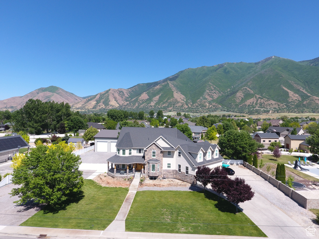 View of mountain backdrop with nearby suburban area