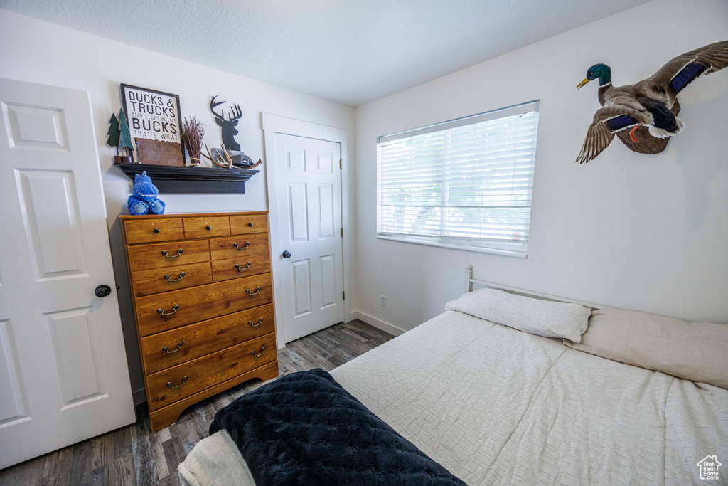 Bedroom with wood finished floors