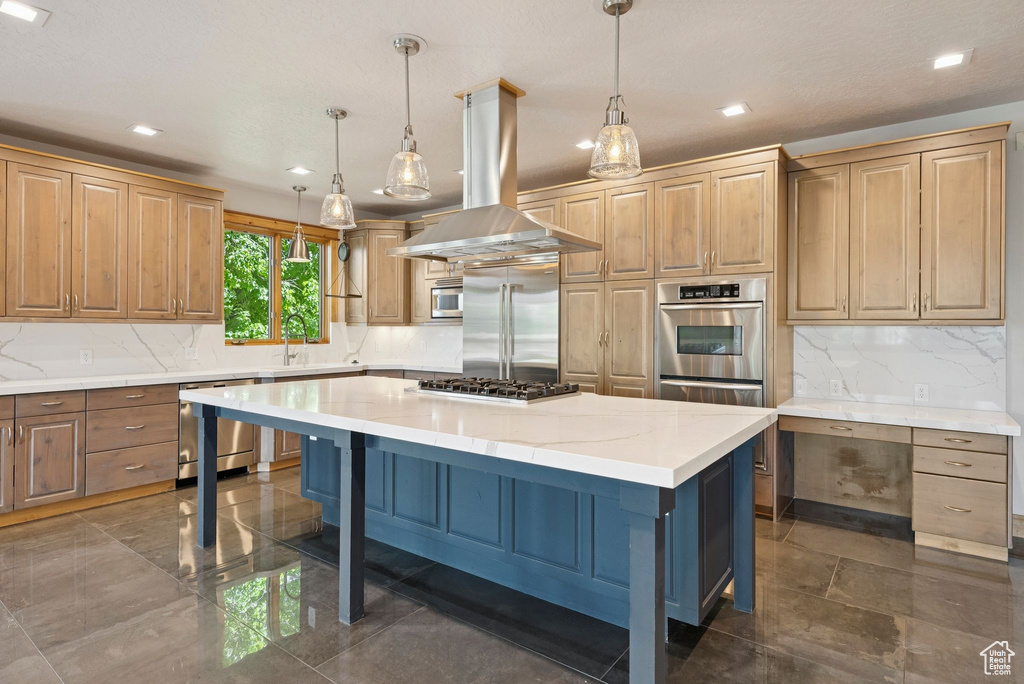 Kitchen with built in appliances, island exhaust hood, a kitchen breakfast bar, recessed lighting, and backsplash