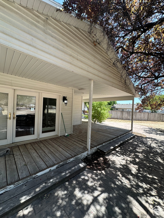 Wooden deck with a patio area