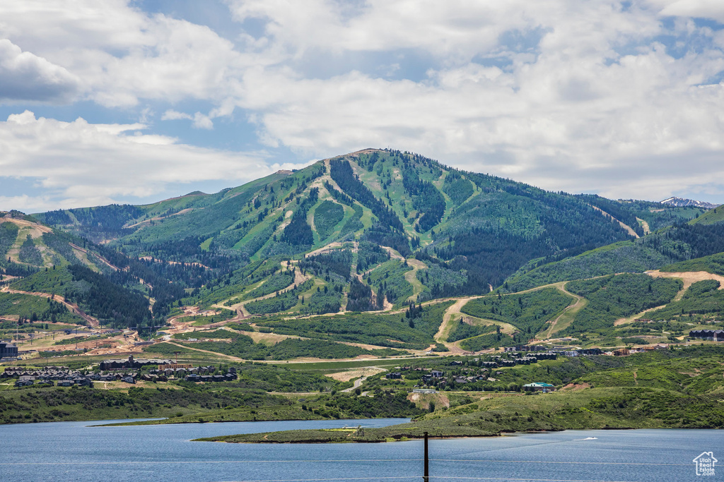 View of mountain background featuring a nearby body of water