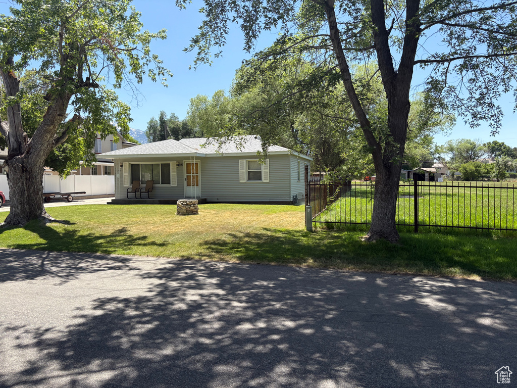 View of front of home with a patio