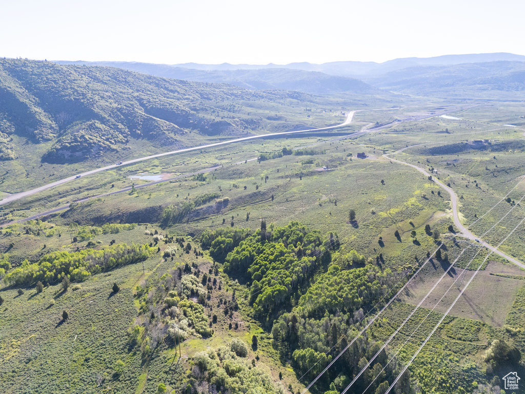 Aerial overview of property's location with mountains