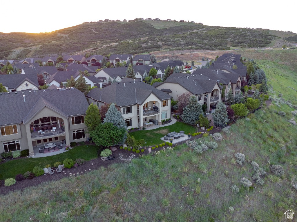 Aerial perspective of suburban area with a mountain backdrop
