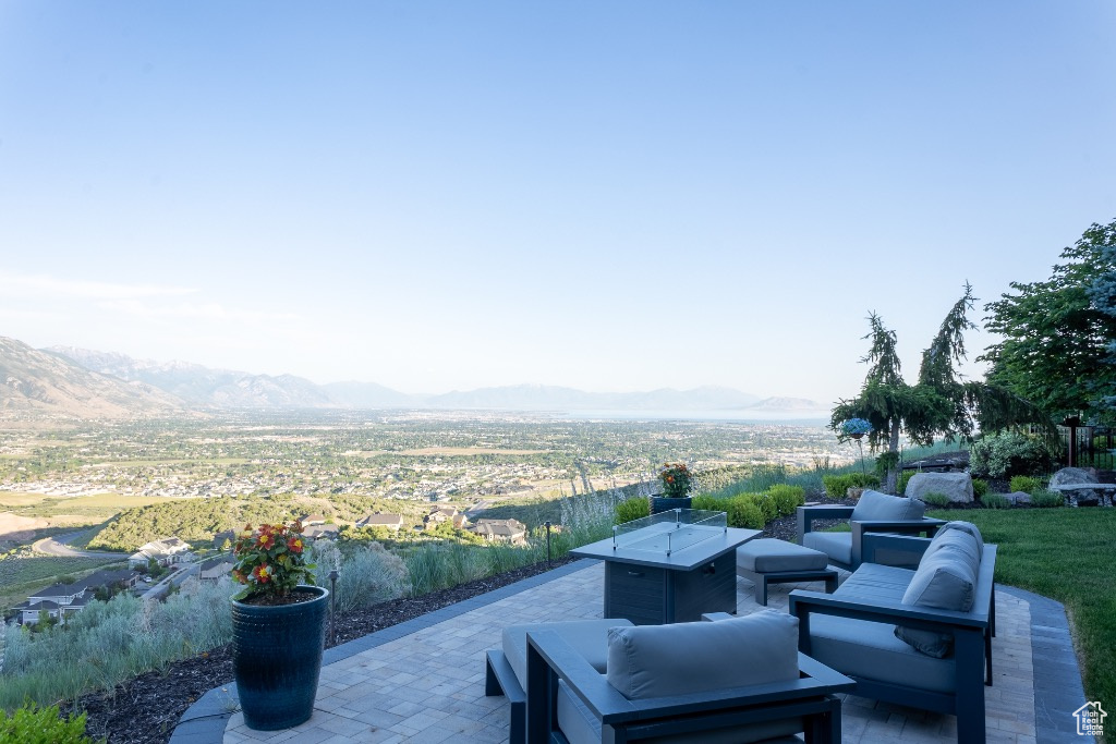View of patio / terrace with a mountain view