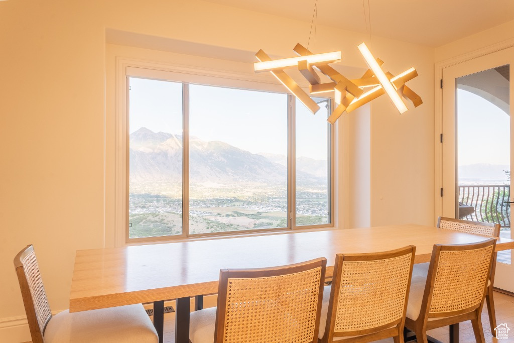 Dining space featuring a mountain view