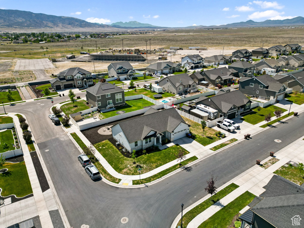 Aerial view of residential area with a mountain backdrop