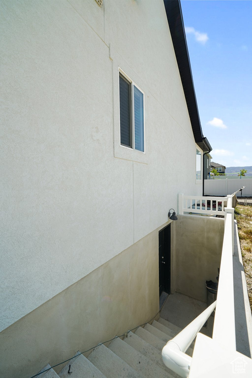 View of home's exterior featuring stucco siding
