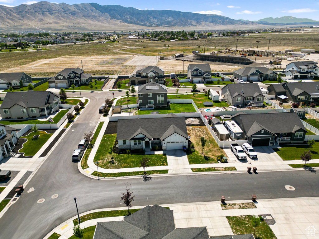 Aerial perspective of suburban area with mountains