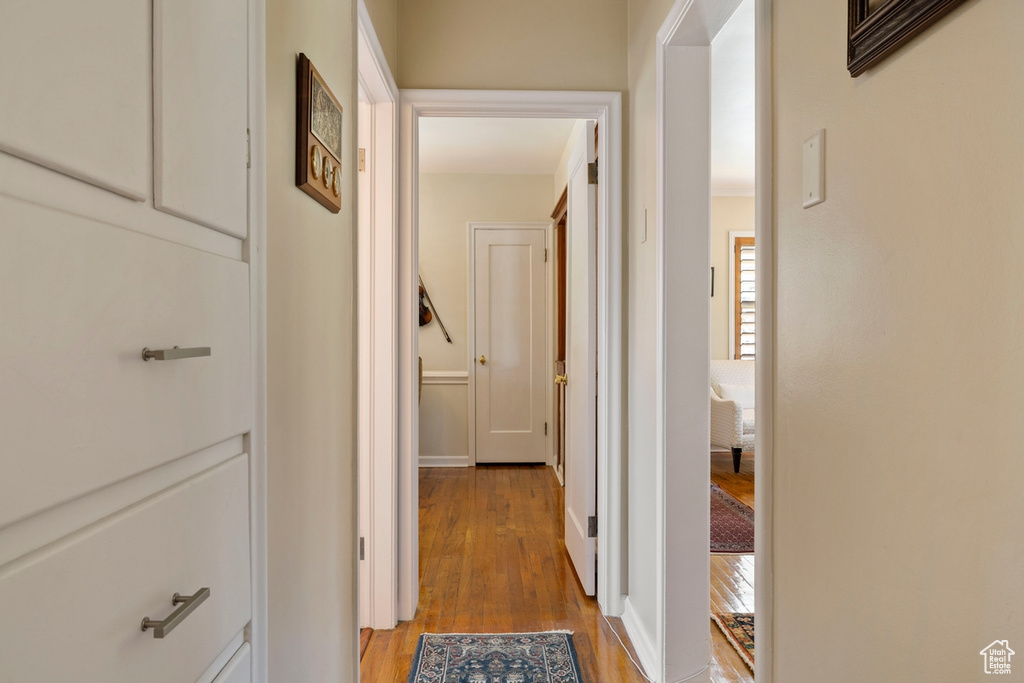 Corridor with light wood finished floors