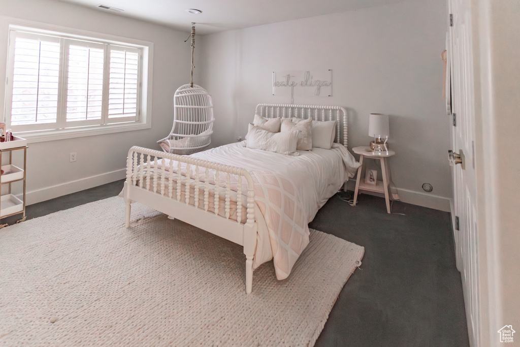 Bedroom featuring baseboards