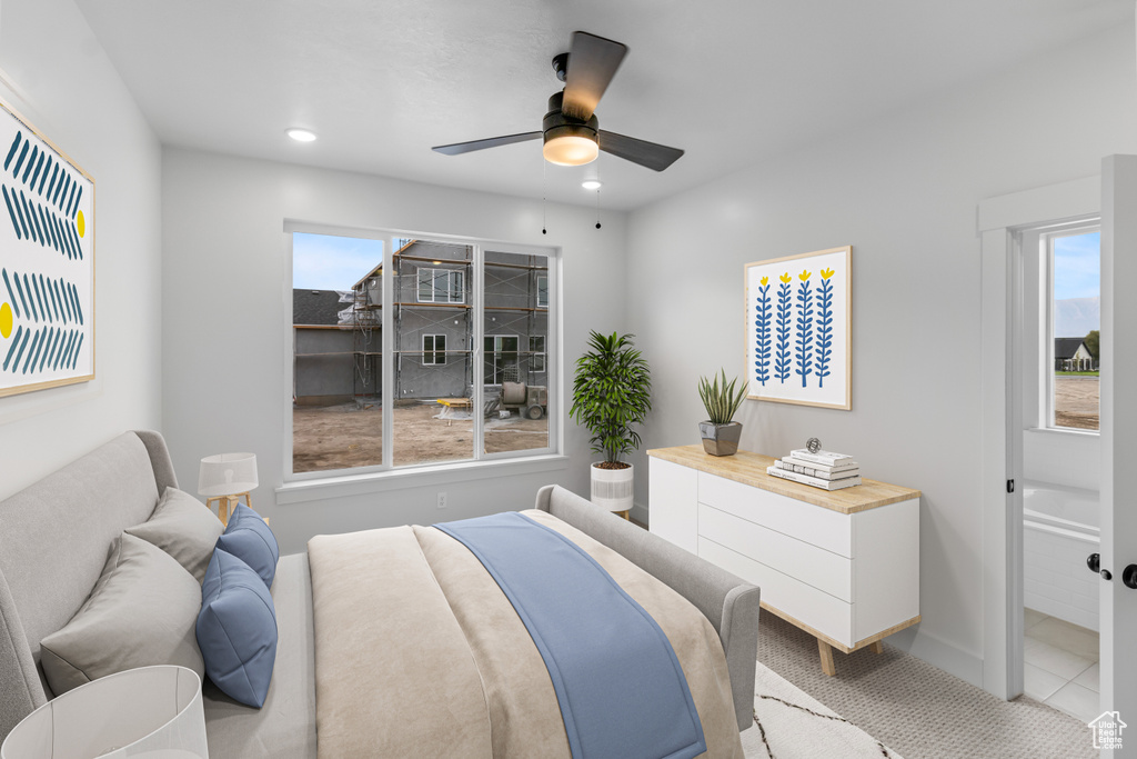 Bedroom with multiple windows, recessed lighting, and ceiling fan
