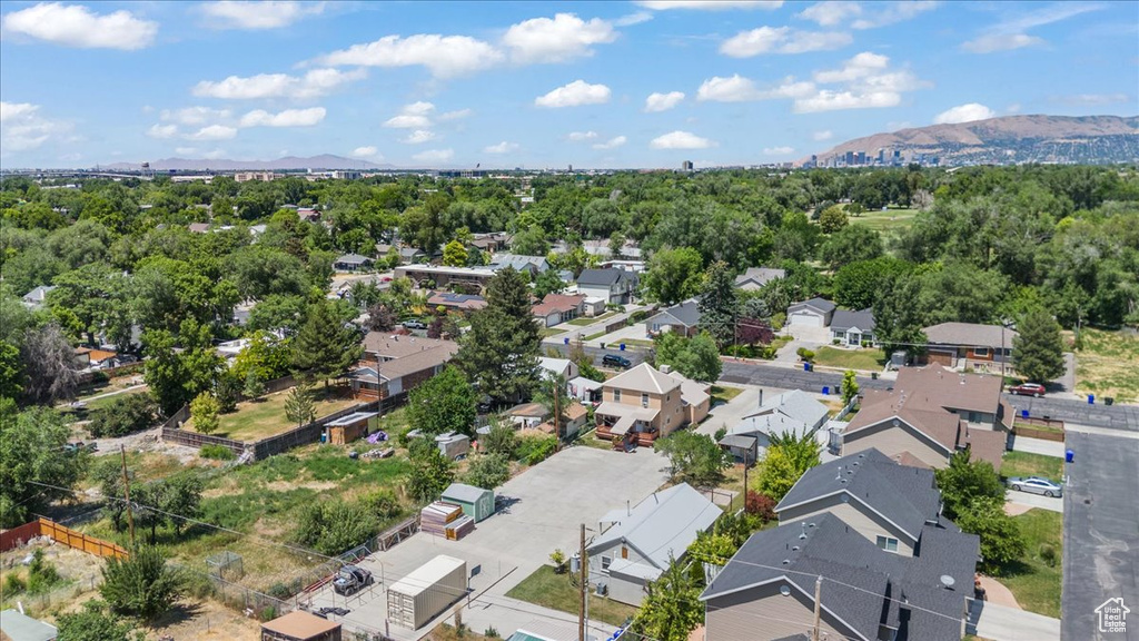 Aerial view of residential area featuring mountains