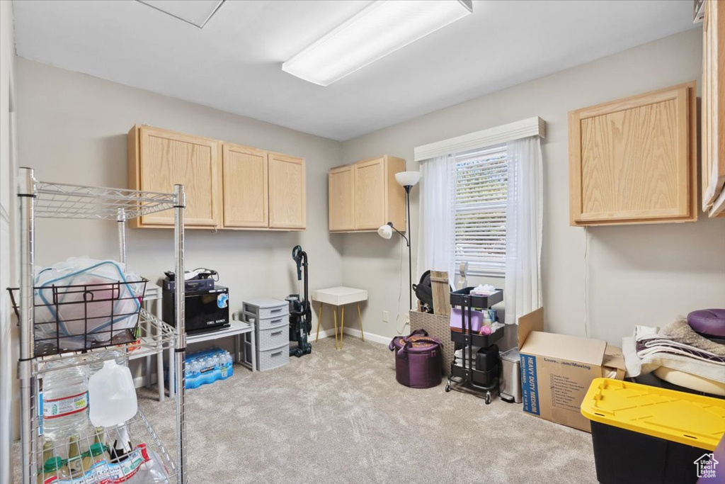 Miscellaneous room featuring carpet and baseboards