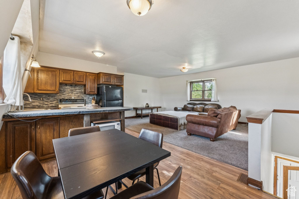 Dining room featuring light wood-style flooring