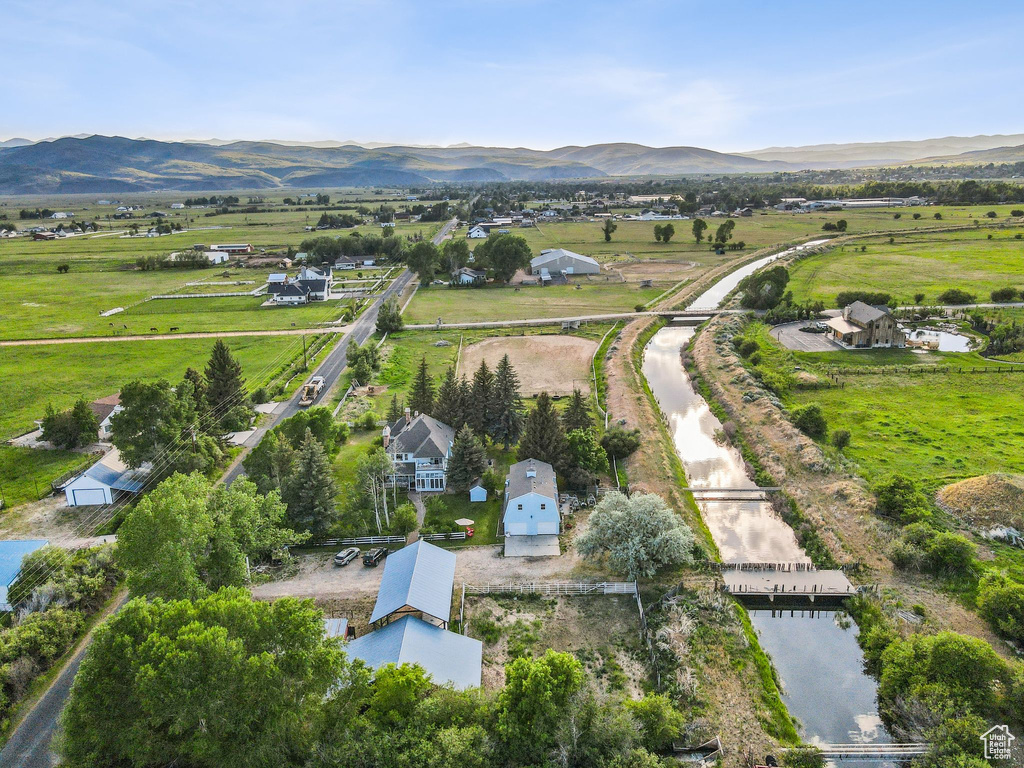 Aerial view of sparsely populated area featuring a mountainous background