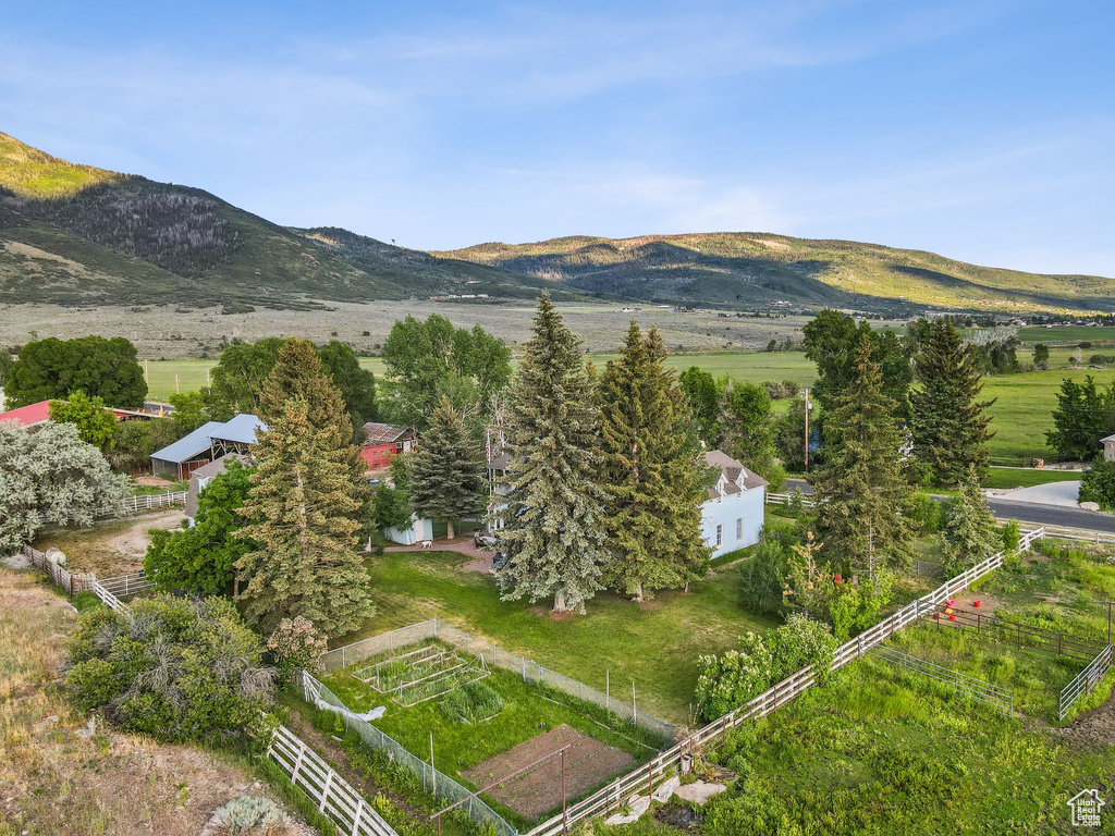 View of mountain backdrop featuring rural landscape